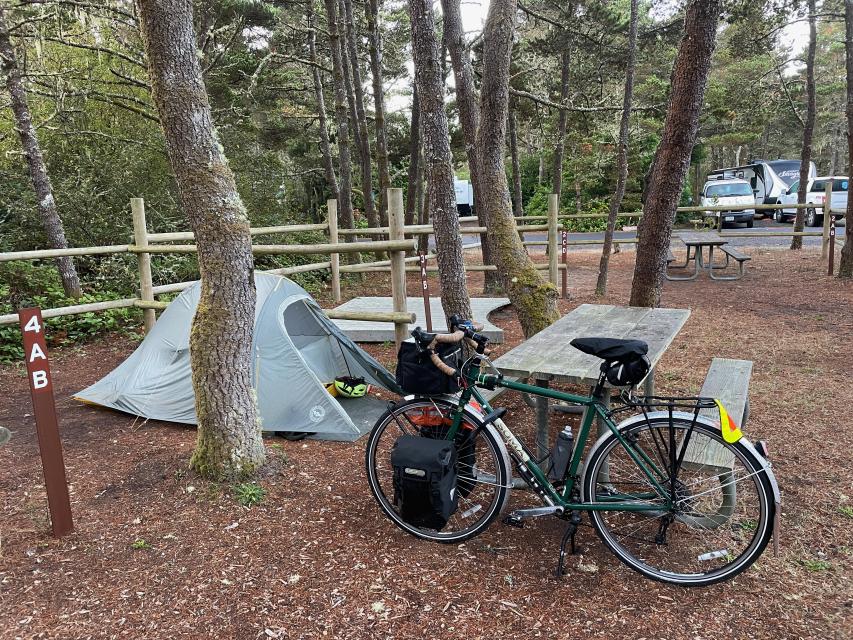 Bike, tent, and picnic table