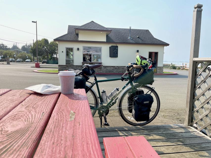 Coffee stop with bike and picnic table