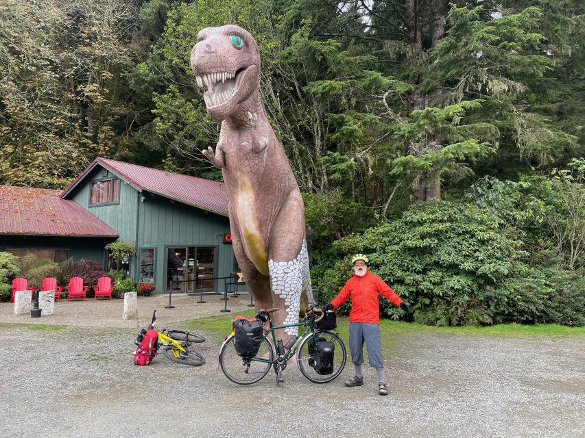 Me in front of a T-Rex statue